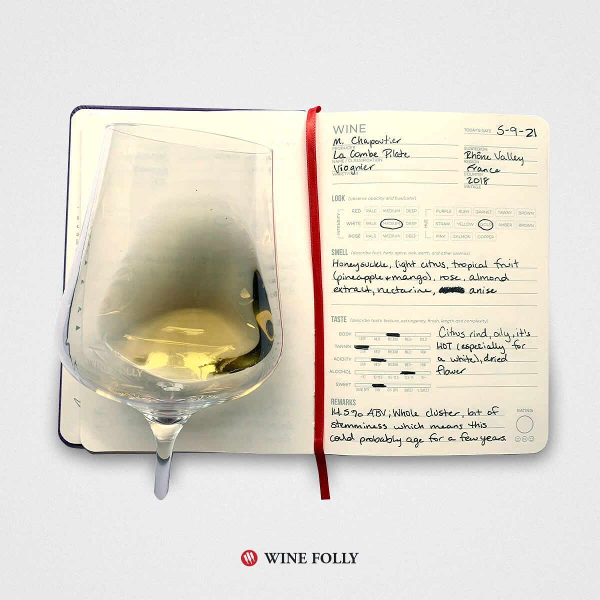 open wine journal with an entry about french viognier